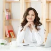 young-attractive-woman-modern-office-desk-working-with-laptop-thinking-about-something